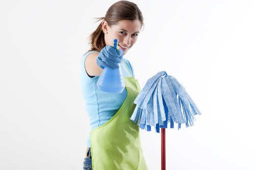 Professional oven cleaning service in Barnes removing grease from an oven interior