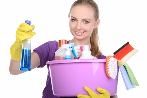 Vacuuming and dusting in a family home in Barnes