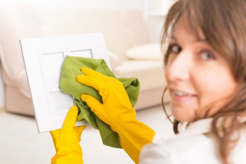 Technician treating stains during upholstery cleaning in Barnes